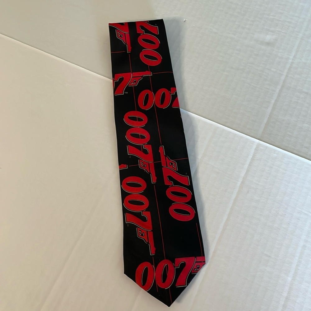 007 Allover tie by Ralph Marlin “ James Bond 007” ©️Eon productions 1995, NWT